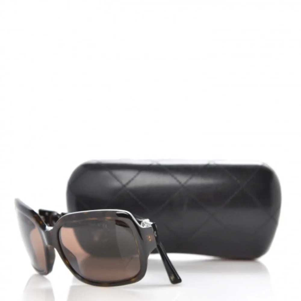 Chanel Rotating C's Sunglasses.